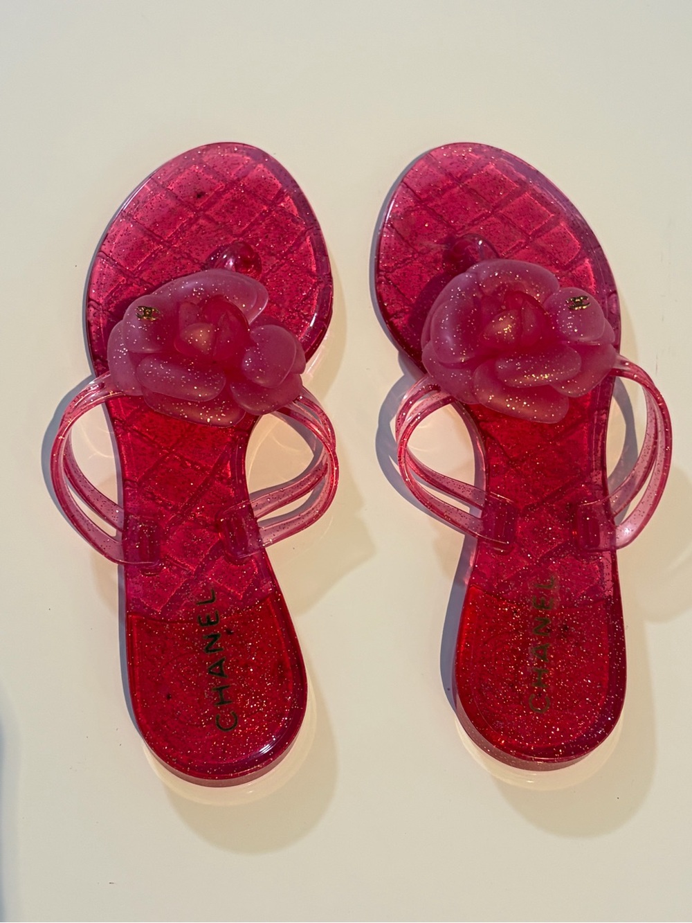 CHANEL Pink Glitter Jelly Sandals with Camellia Accent